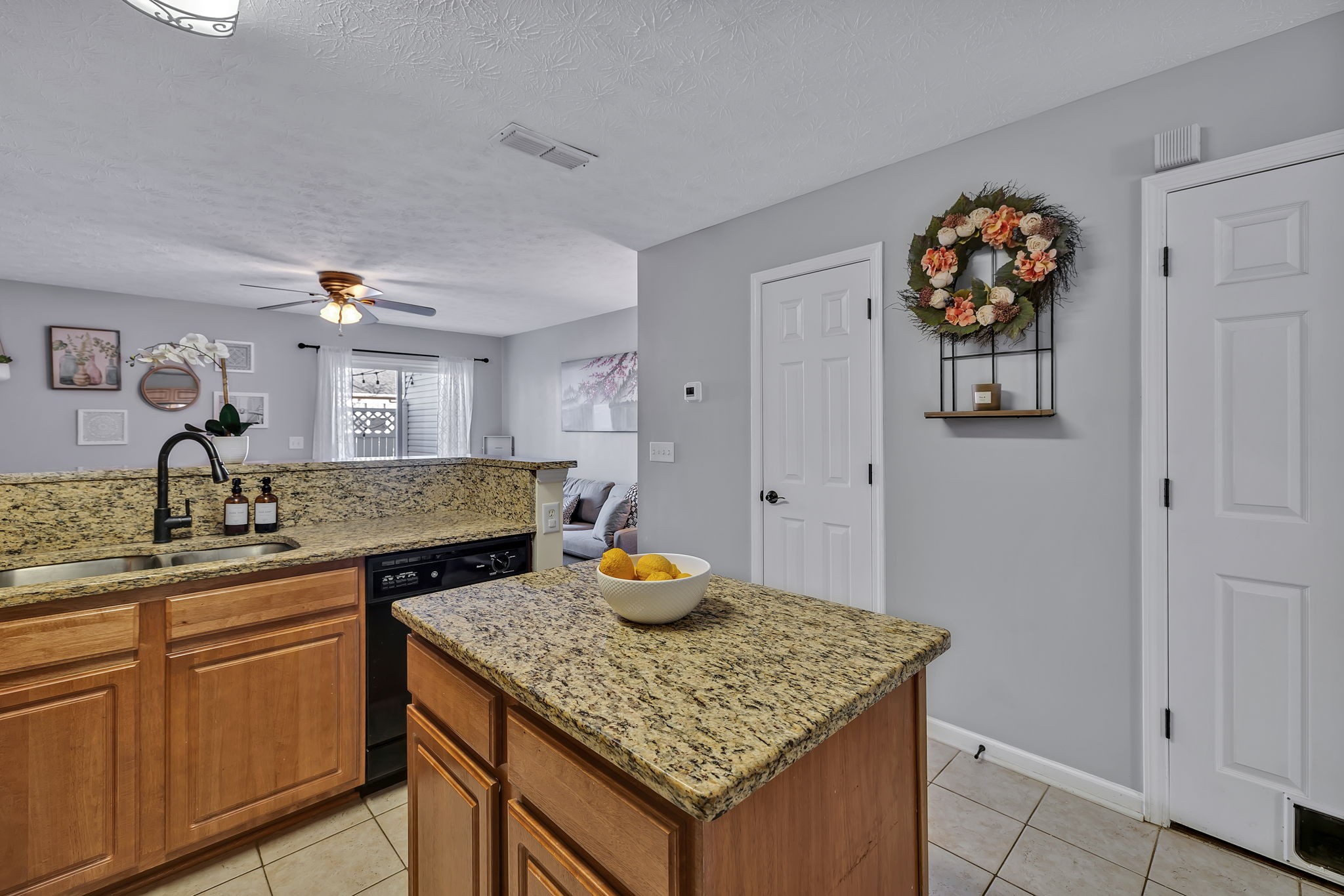 3435 Harpeth Springs Drive Nashville, TN 37221 - Photo 11 of 34 a kitchen with cabinets and chandelier