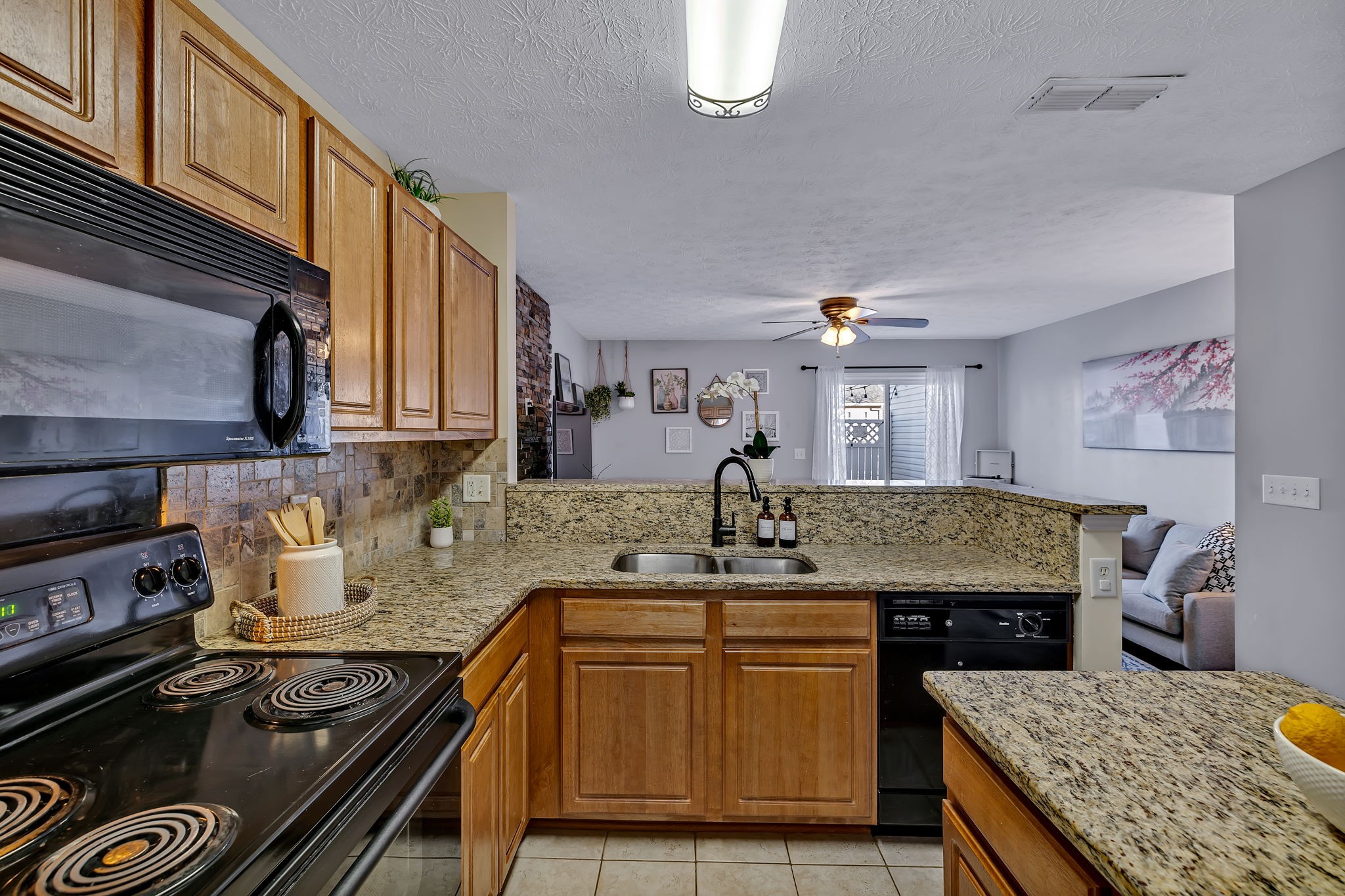 3435 Harpeth Springs Drive Nashville, TN 37221 - Photo 12 of 34 a kitchen with a stove and a sink