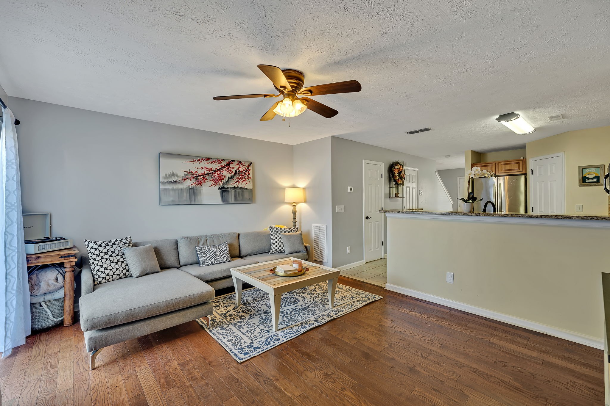 3435 Harpeth Springs Drive Nashville, TN 37221 - Photo 15 of 34 a living room with furniture and a wooden floor
