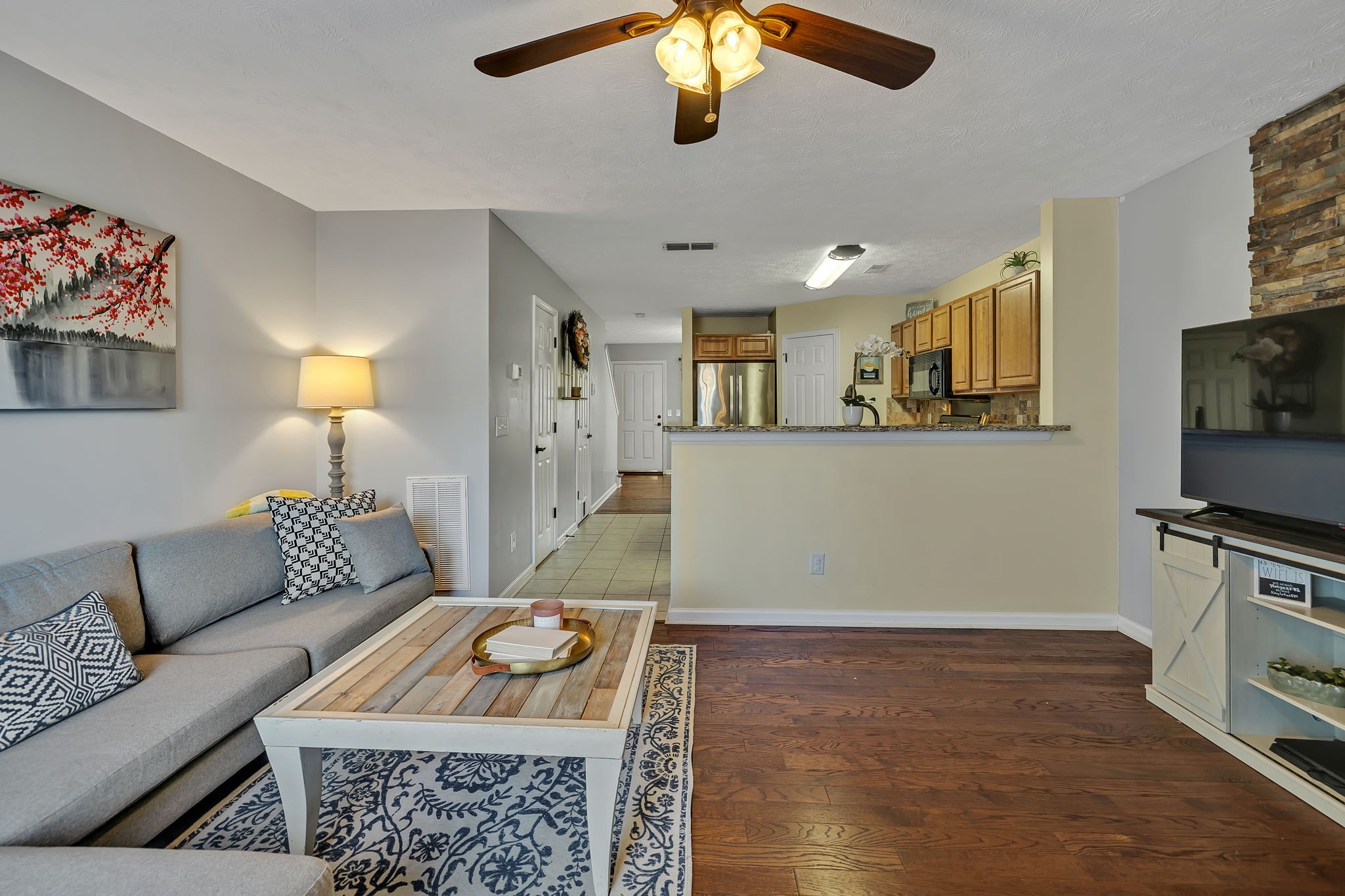 3435 Harpeth Springs Drive Nashville, TN 37221 - Photo 17 of 34 a living room with furniture and a flat screen tv