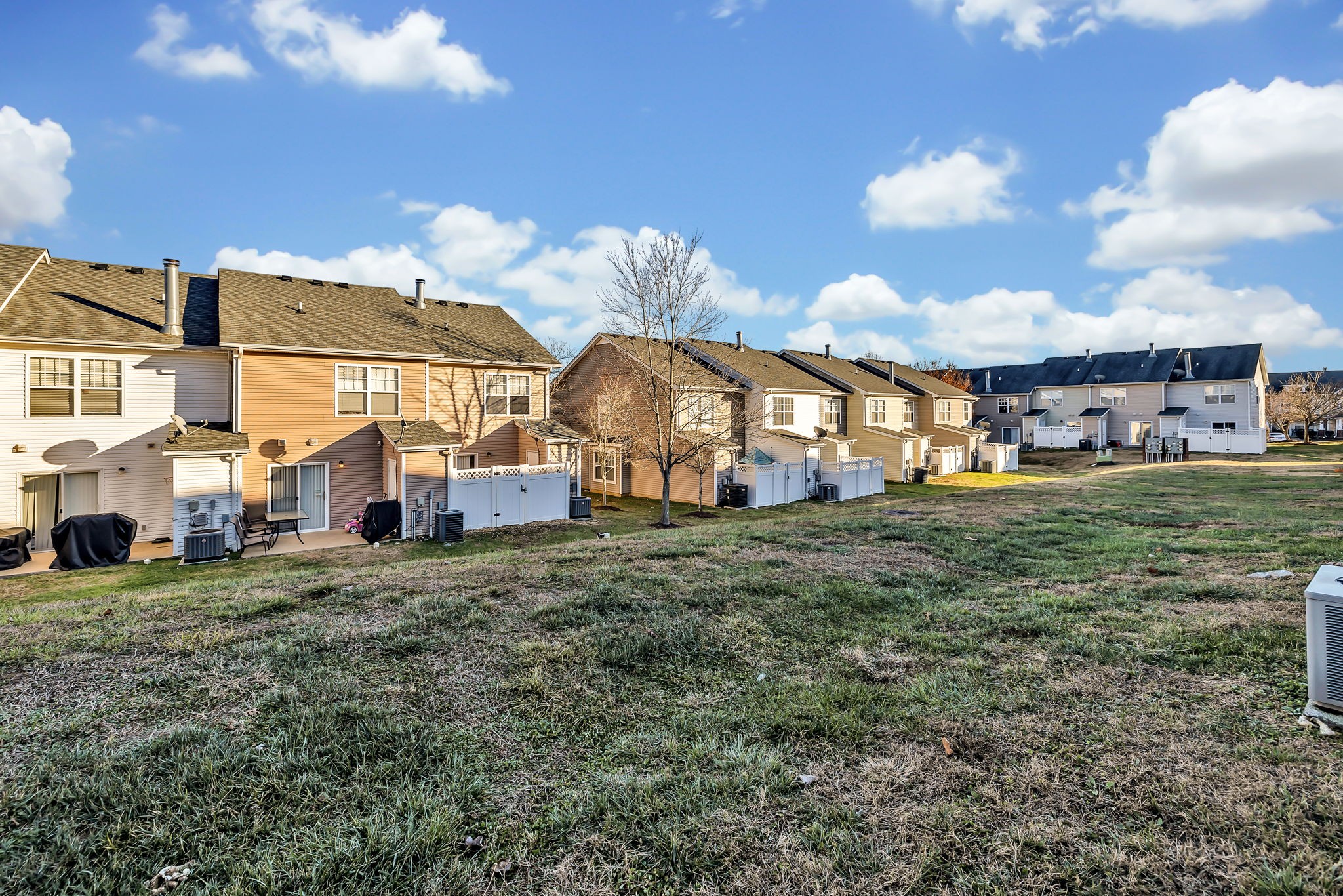3435 Harpeth Springs Drive Nashville, TN 37221 - Photo 28 of 34 a view of a big house with a big yard and large trees