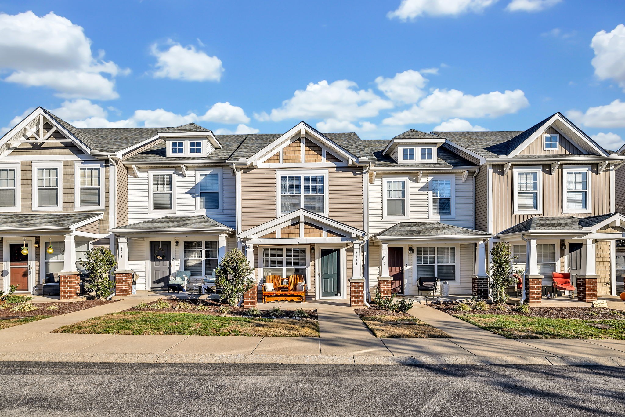 3435 Harpeth Springs Drive Nashville, TN 37221 - Photo 34 of 34 a front view of a residential apartment building with a yard