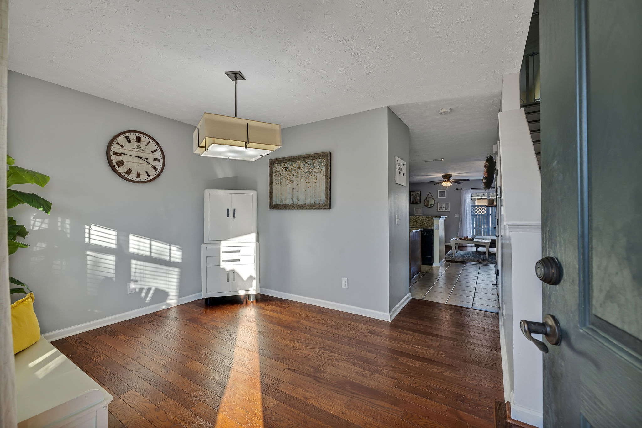 3435 Harpeth Springs Drive Nashville, TN 37221 - Photo 6 of 34 a view of a hallway with wooden floor and a kitchen