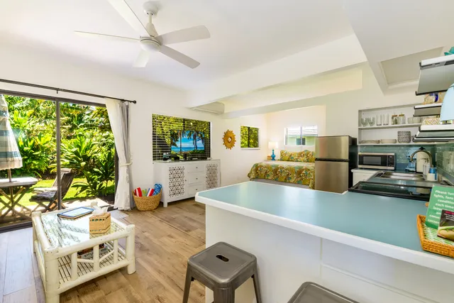 a view of a living room and dining room