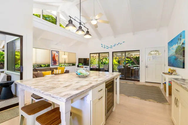 a view of a dining table and chairs in a room