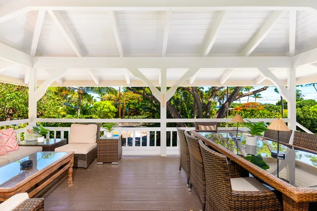 swimming pool view with a seating space