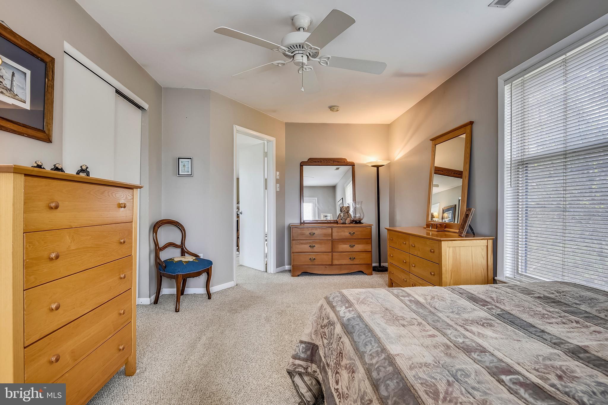 19933 Middletown Road Freeland, MD 21053 - Photo 18 of 36 a bedroom with a bed and wooden floor