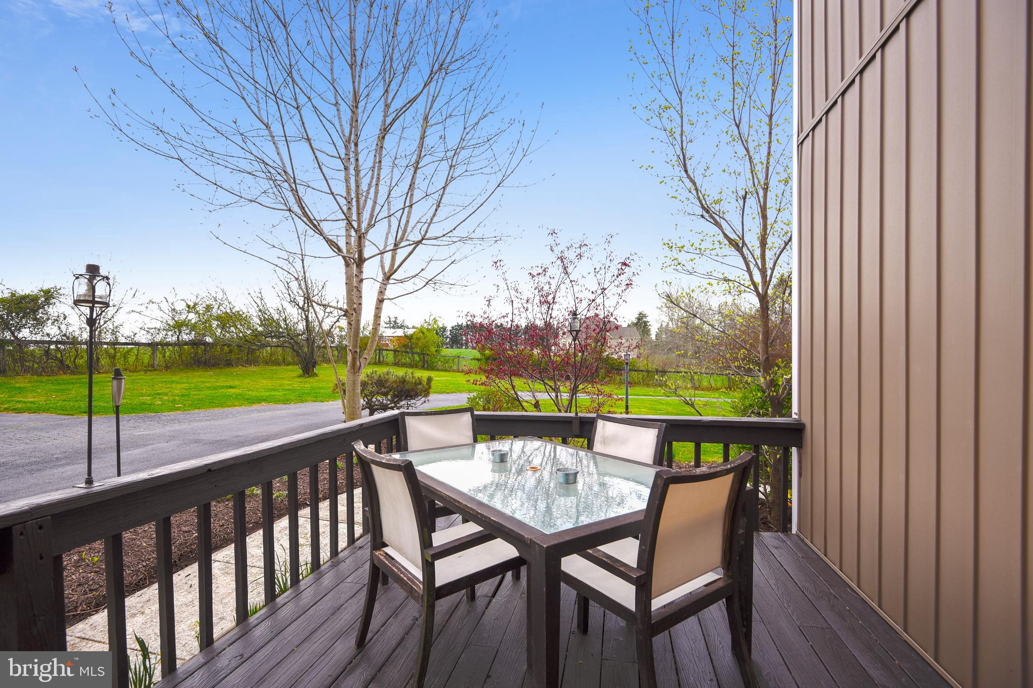 19933 Middletown Road Freeland, MD 21053 - Photo 24 of 36 a view of a chairs and table in patio with a yard