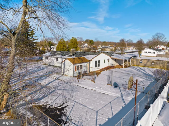 a picture of the house with outdoor seating