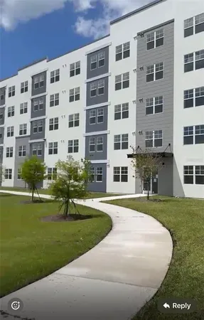 a view of building with garden