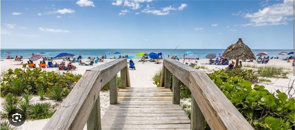 0 Bayshore Drive Naples, FL 34112 - Photo 11 of 18 a view of a hallway with lots of frames on deck