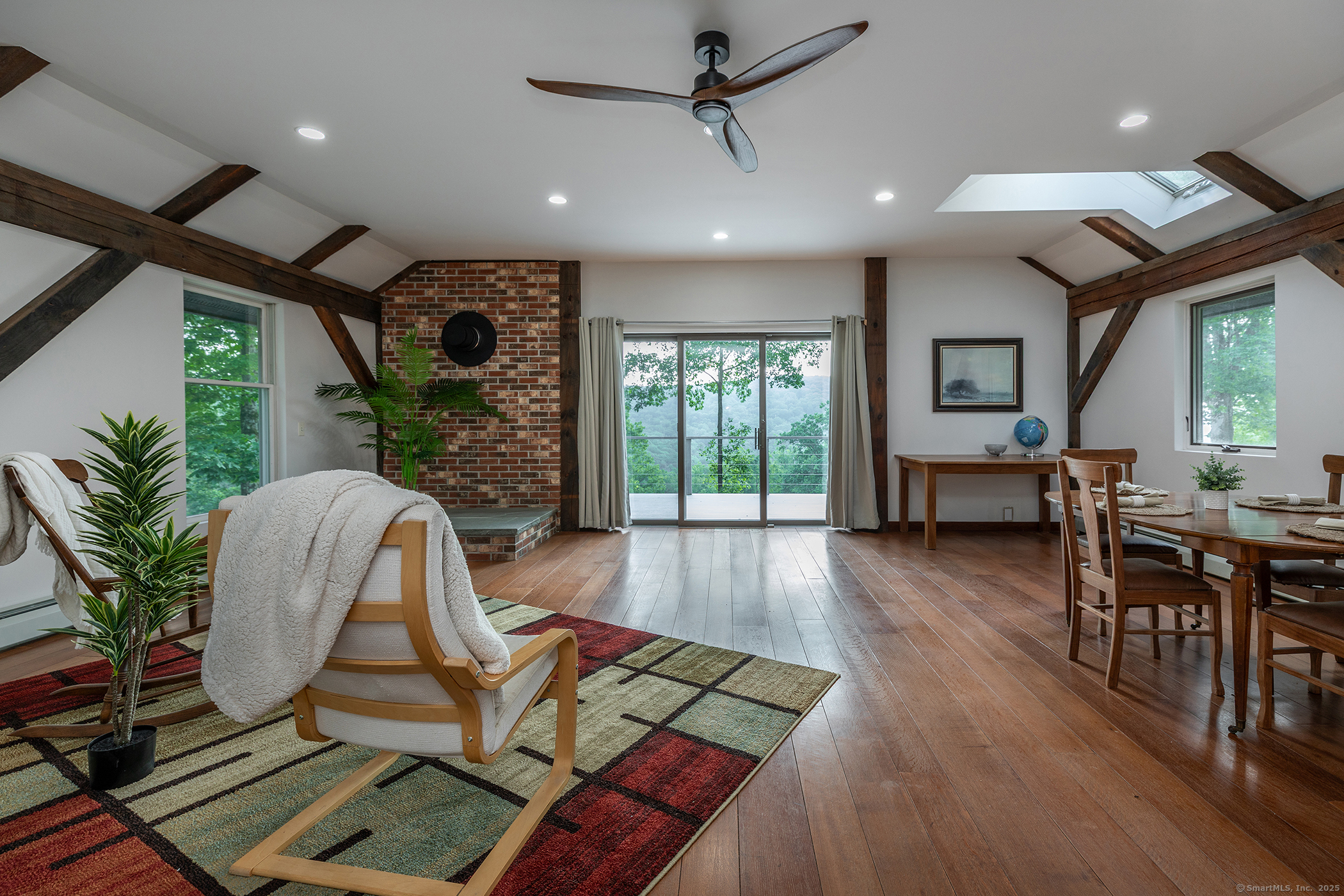 178 Carter Road Kent, CT 06754 - Photo 11 of 37 a living room with furniture floor to ceiling window and wooden floor