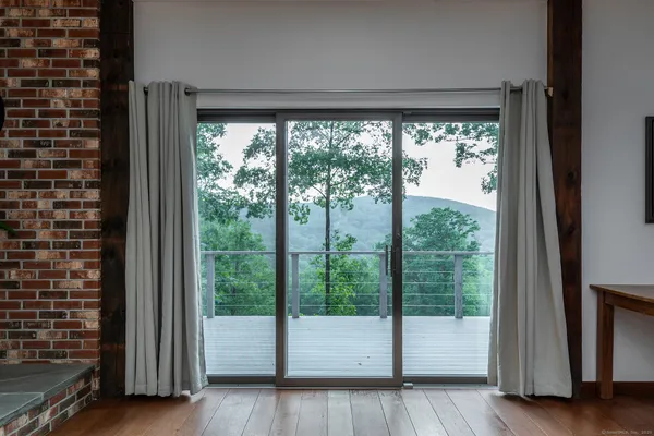 a view of room with window and floor to ceiling window