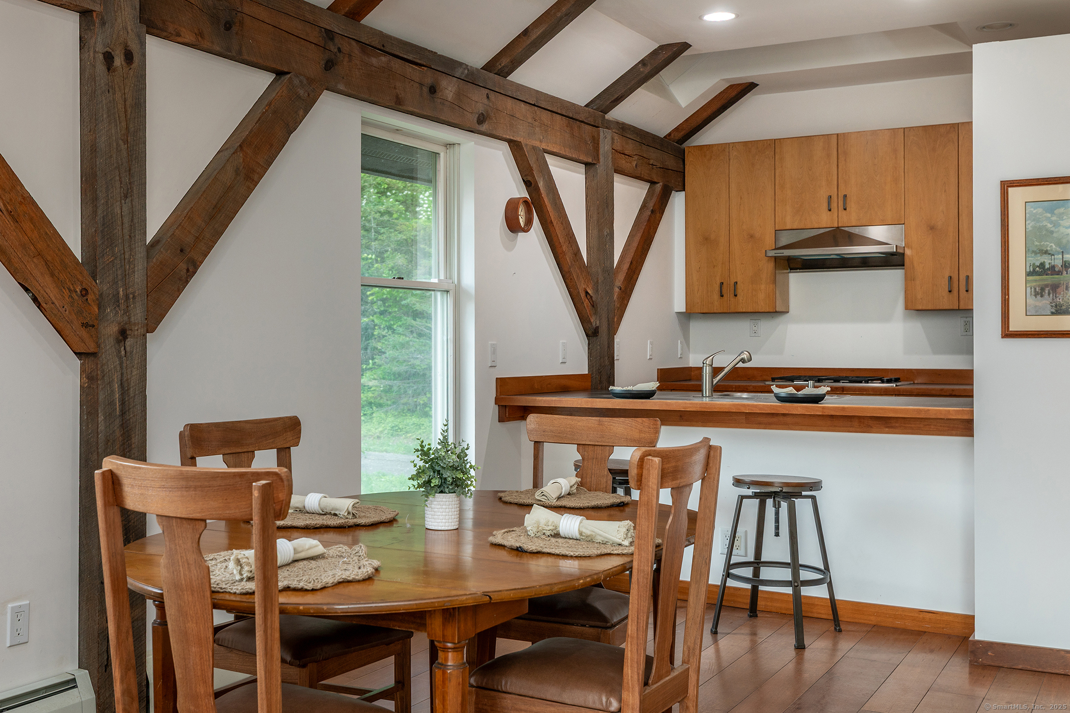 178 Carter Road Kent, CT 06754 - Photo 18 of 37 a view of a dining room with furniture and wooden floor