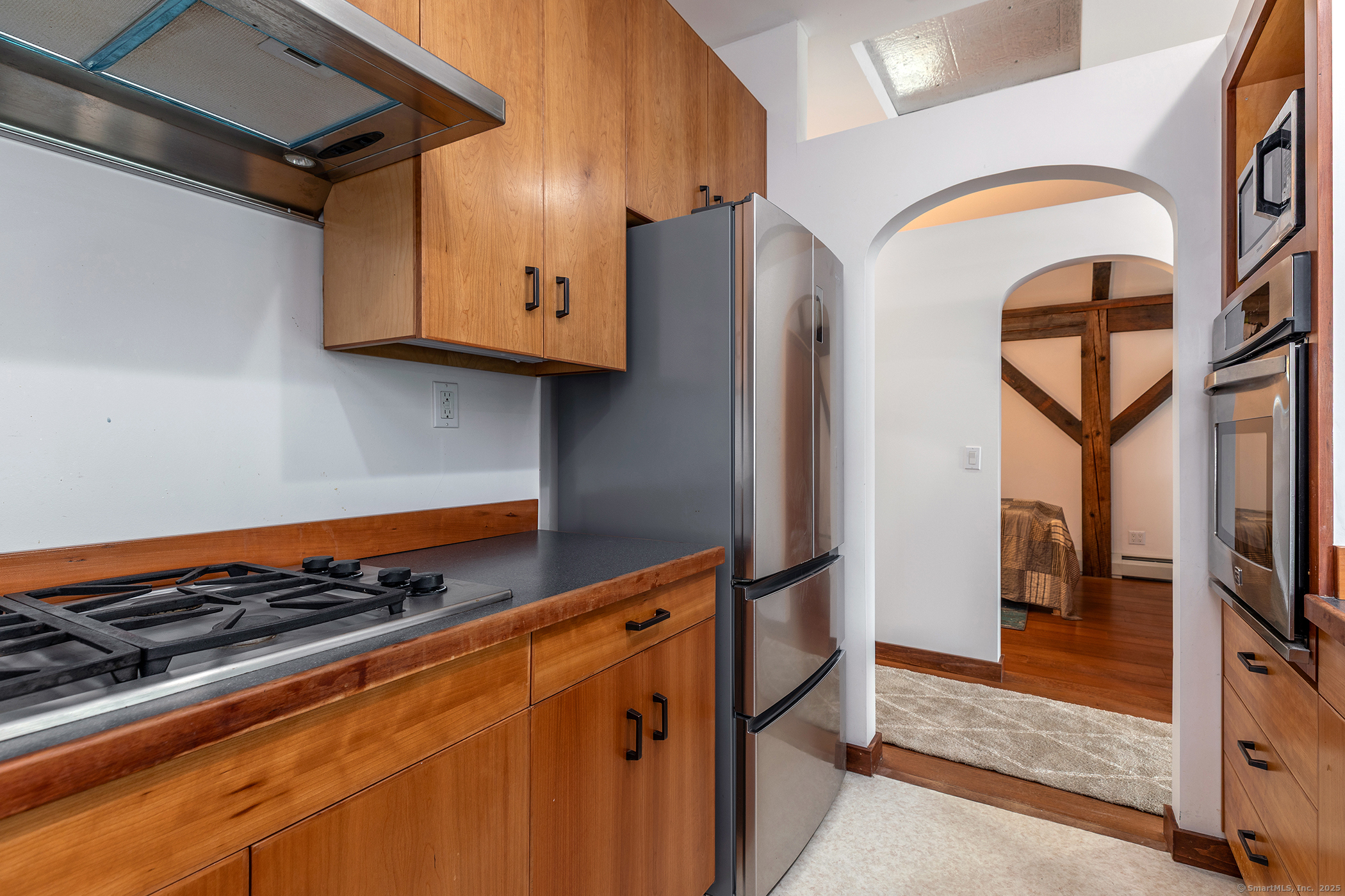 178 Carter Road Kent, CT 06754 - Photo 20 of 37 a kitchen with stainless steel appliances granite countertop a refrigerator and a stove