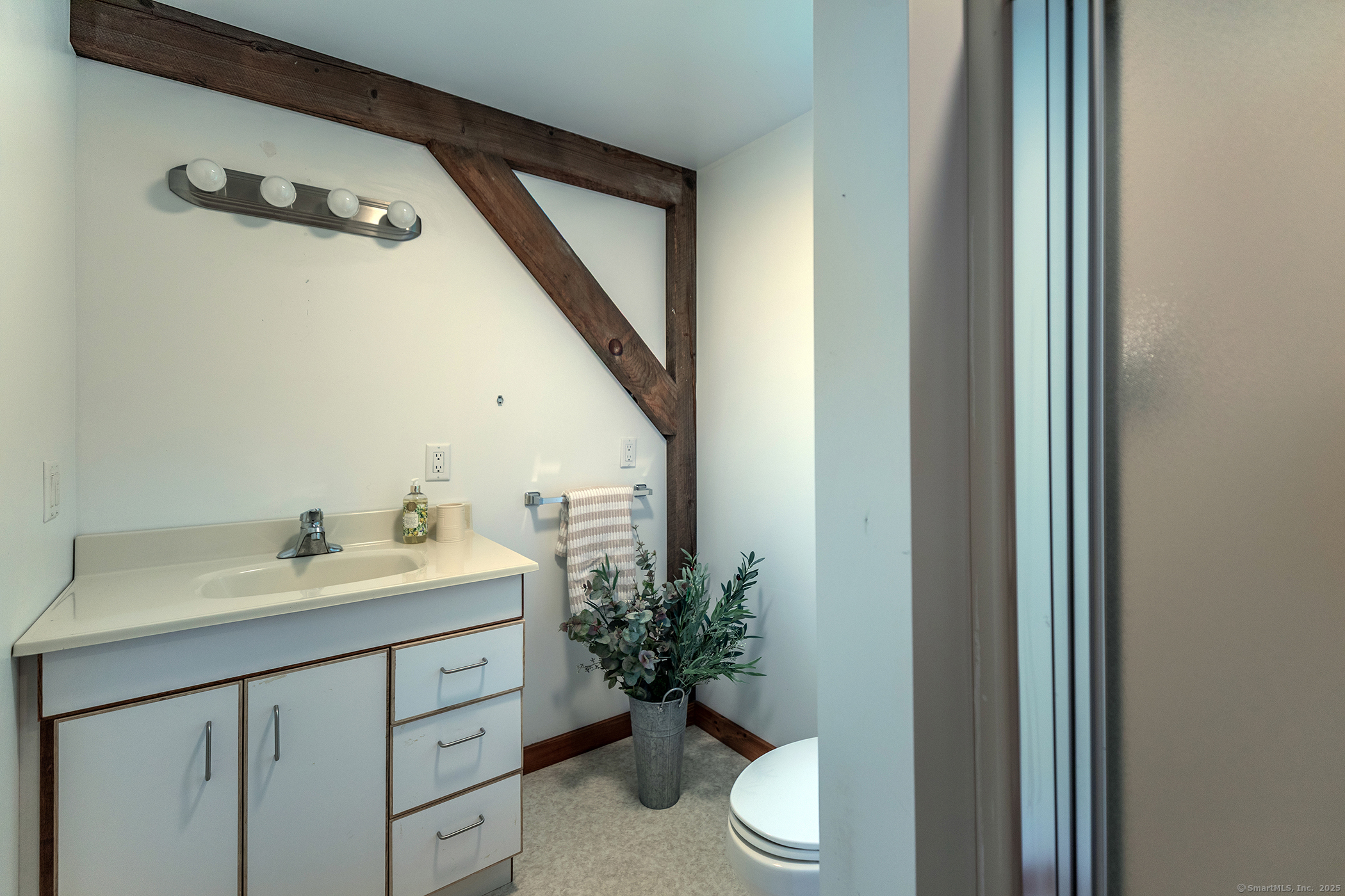 178 Carter Road Kent, CT 06754 - Photo 22 of 37 a bathroom with a sink a toilet and a mirror