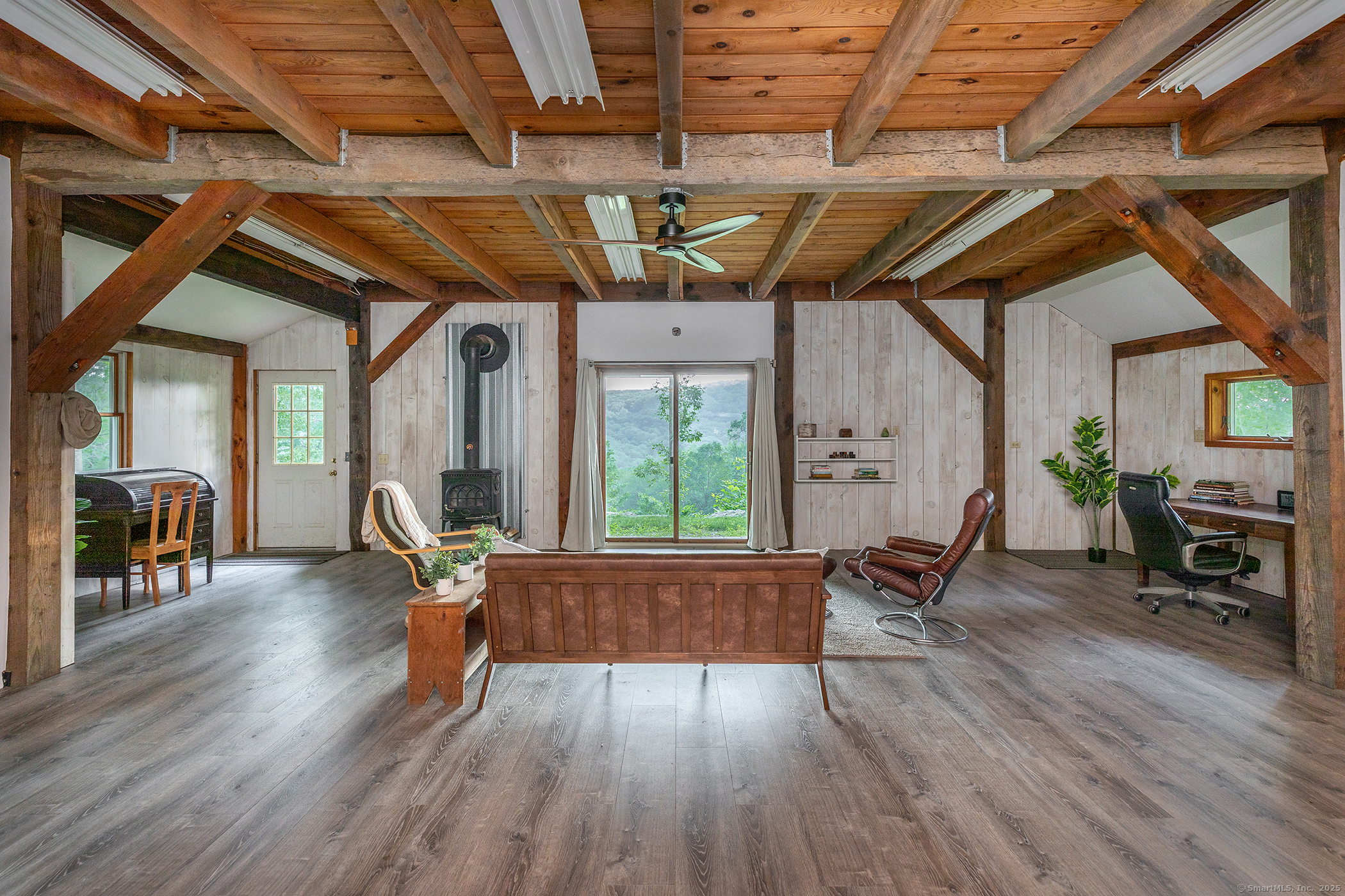 178 Carter Road Kent, CT 06754 - Photo 23 of 37 a living room with furniture wooden floor and a window