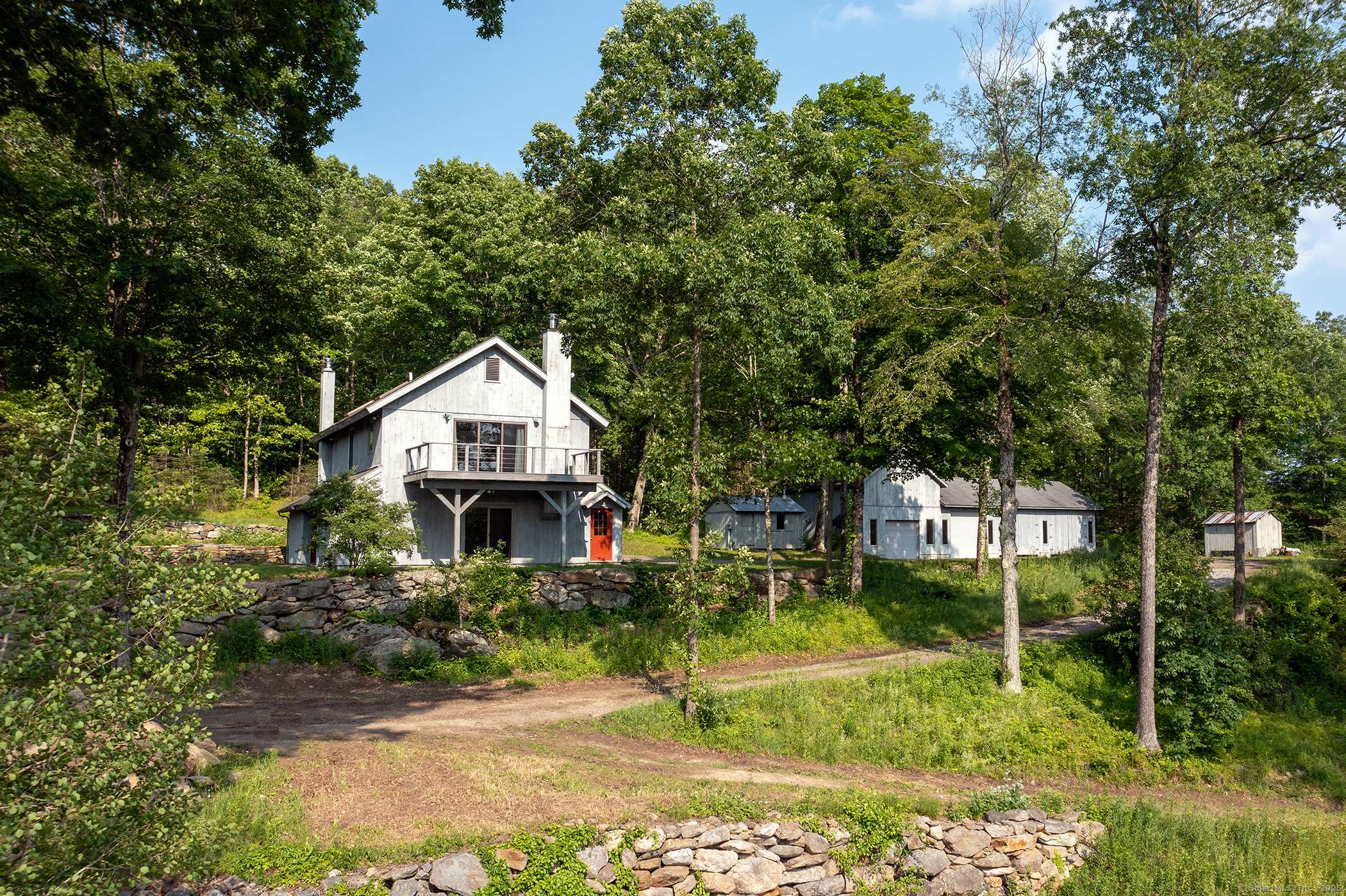 178 Carter Road Kent, CT 06754 - Photo 3 of 37 a house view with a garden space