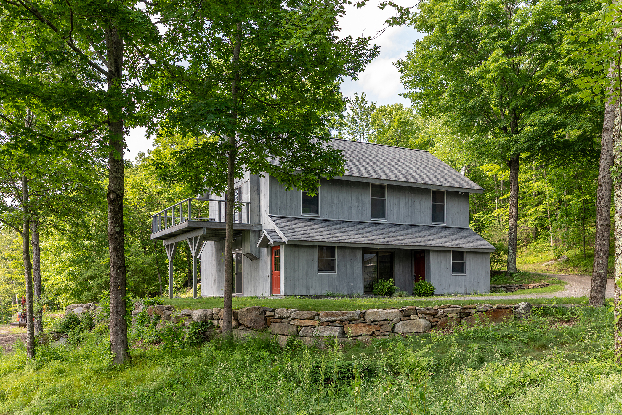 178 Carter Road Kent, CT 06754 - Photo 7 of 37 a front view of a house with a yard