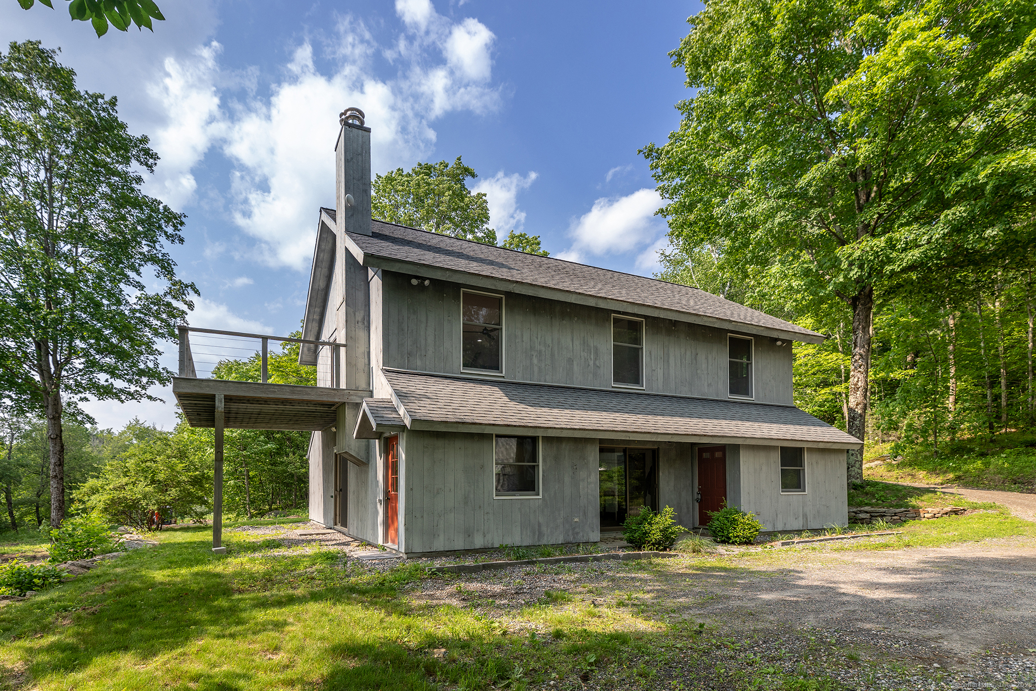 178 Carter Road Kent, CT 06754 - Photo 8 of 37 a front view of a house with garden