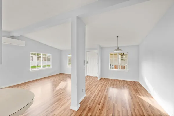 a view of an empty room and window