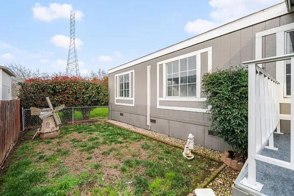 a house view with a backyard space