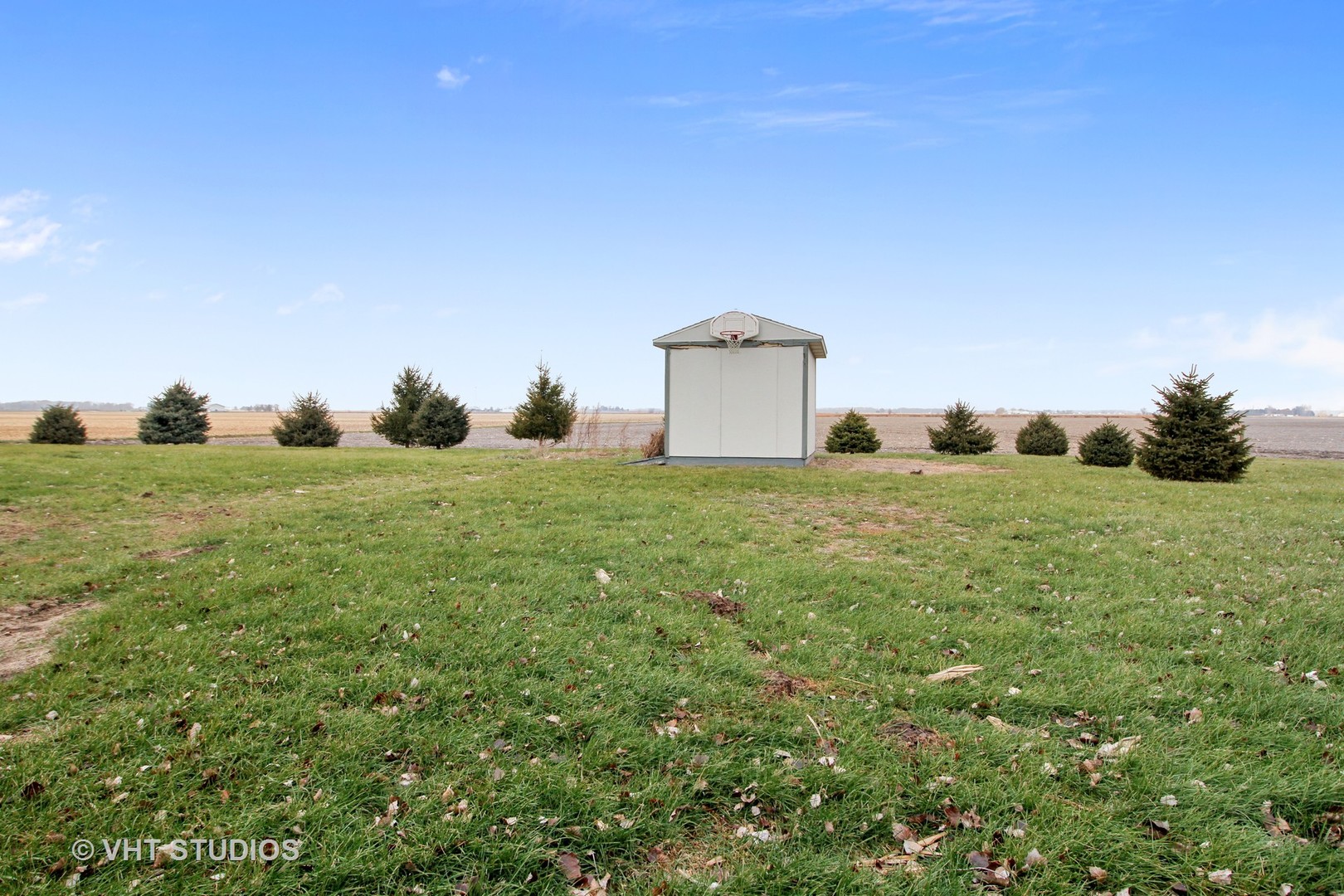 6477 West 5000S Road Herscher, IL 60941 - Photo 14 of 15 a view of a grassy field with an trees