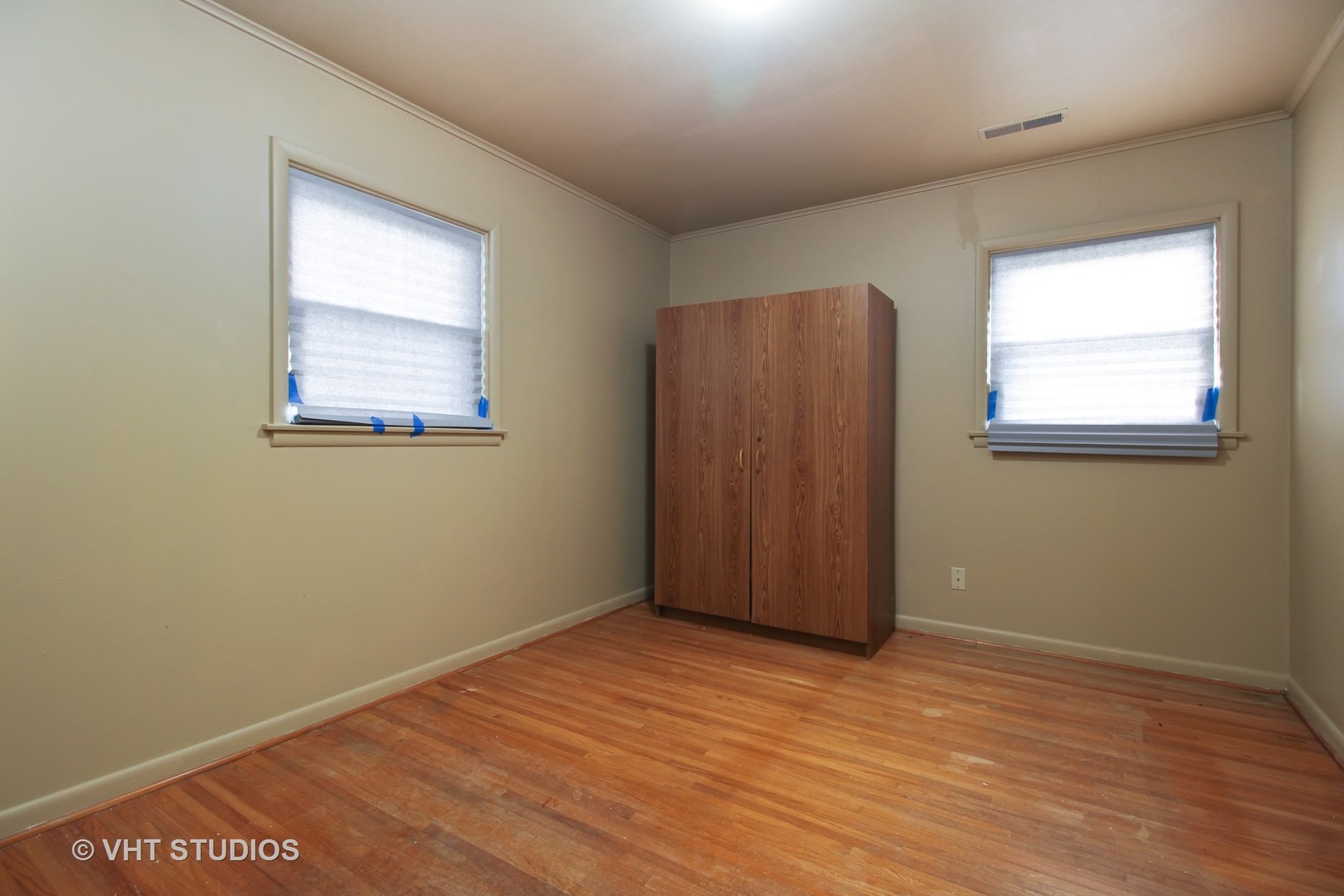 6477 West 5000S Road Herscher, IL 60941 - Photo 8 of 15 an empty room with wooden floor and windows