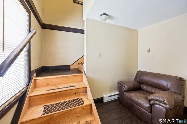 a living room with furniture and a gate