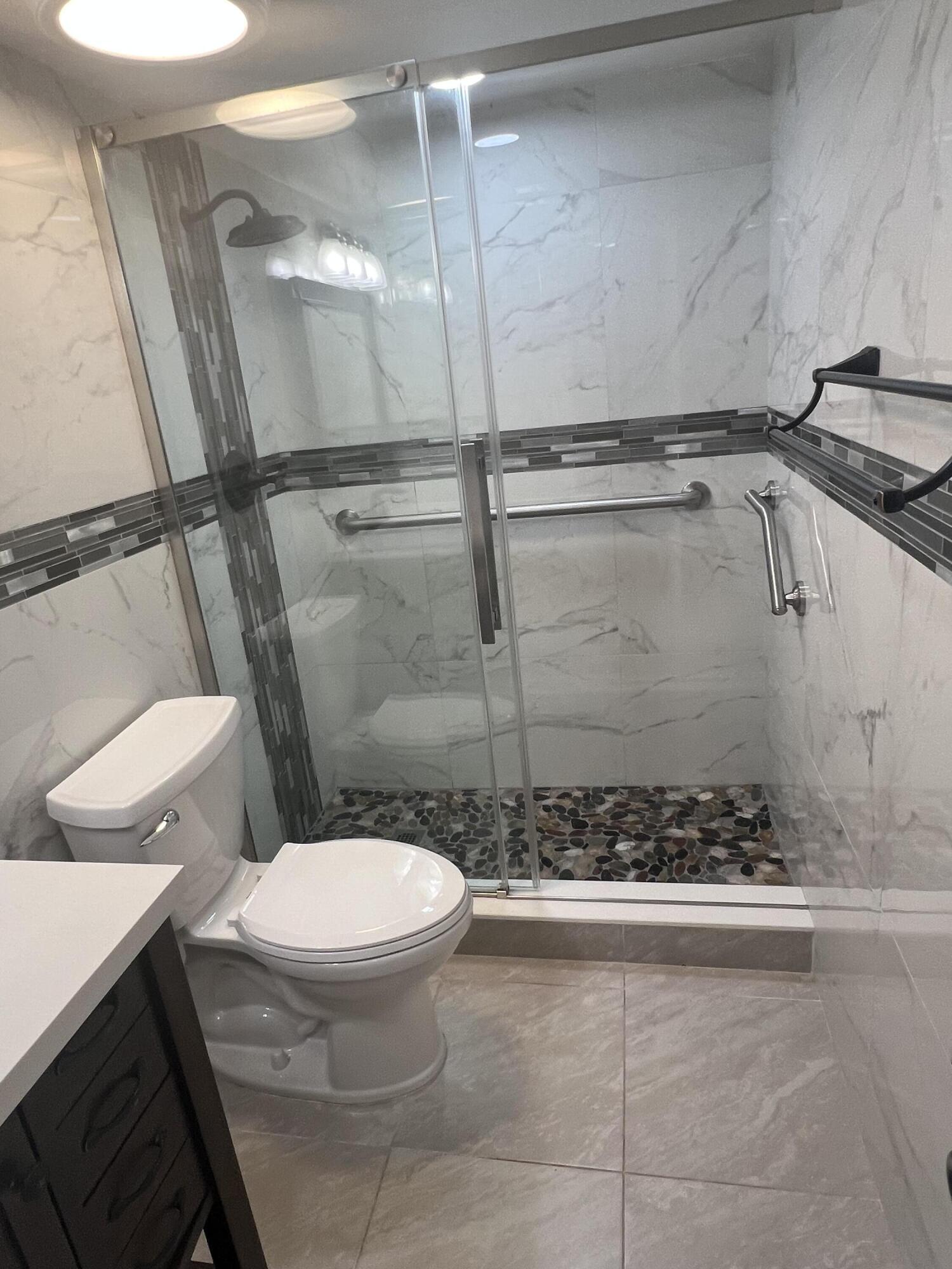 55 Southeast 14th Street, Unit 1010 Boca Raton, FL 33432 - Photo 13 of 19 UPDATED SHOWER