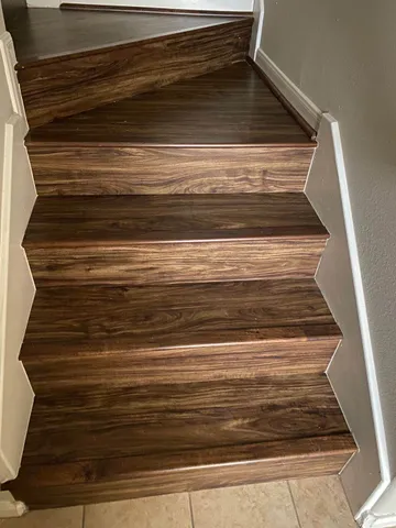 a bathroom with a tub and shower