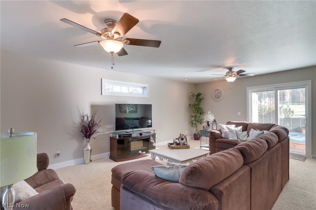 11516 Girdled Road Painesville, OH 44077 - Photo 3 of 24 This large great room can accommodate a crowd while watching your favorite sports team.