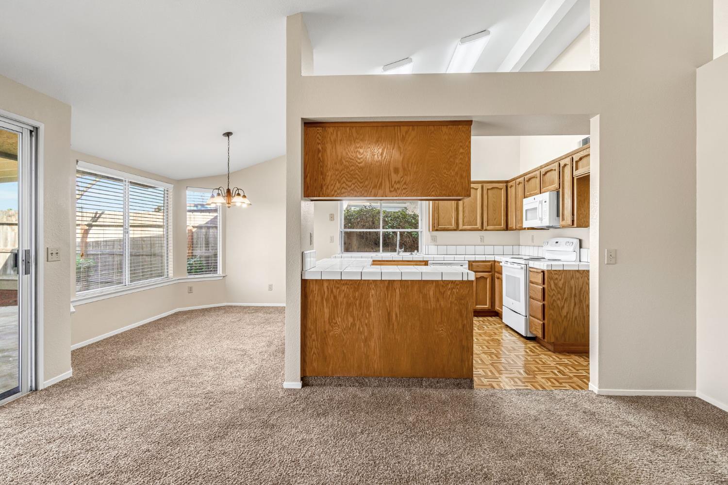 3837 North State Street Fresno, CA 93722 - Photo 12 of 33 a view of livingroom with kitchen