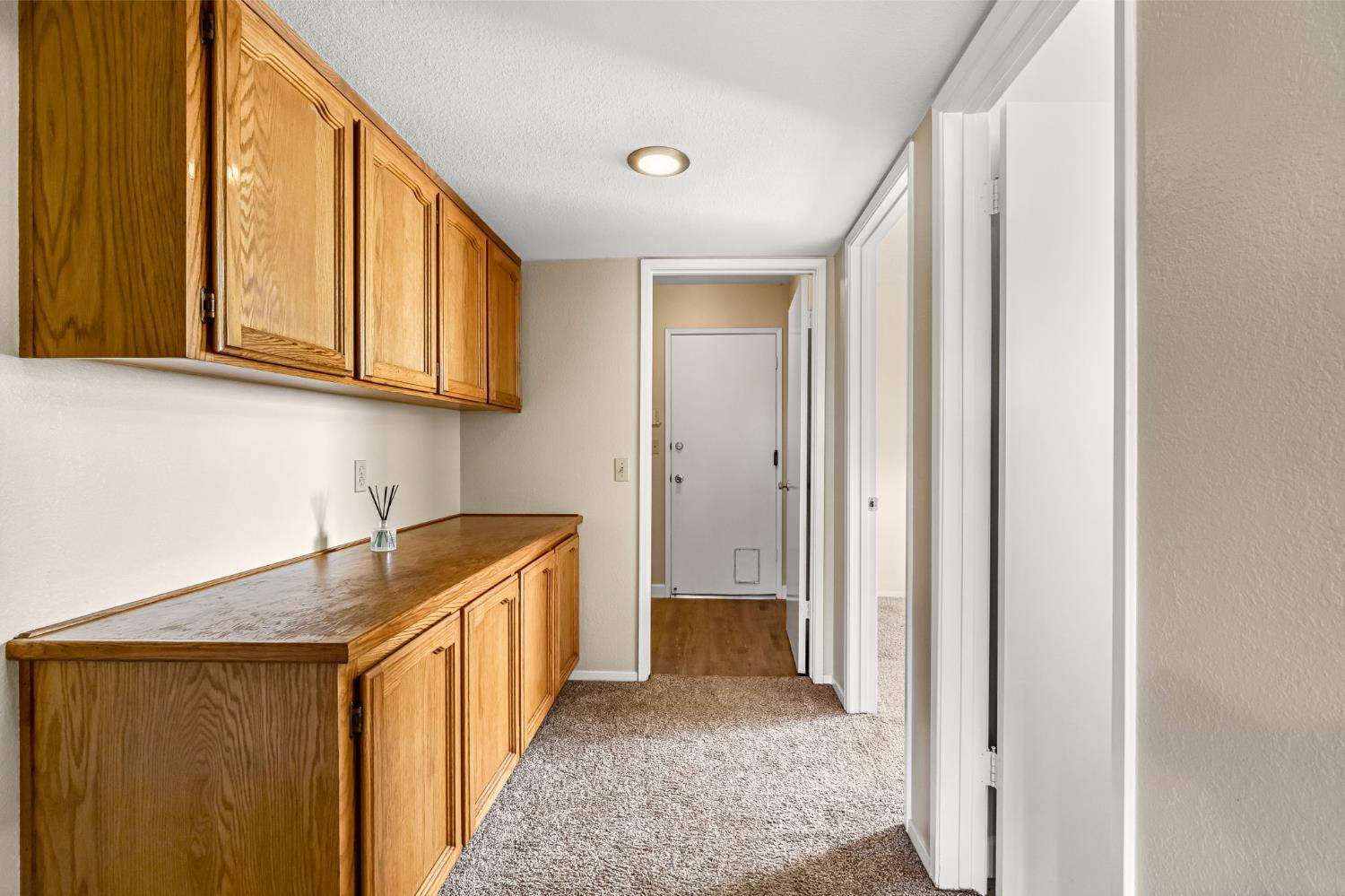 3837 North State Street Fresno, CA 93722 - Photo 21 of 33 a view of a kitchen with sink and cabinets