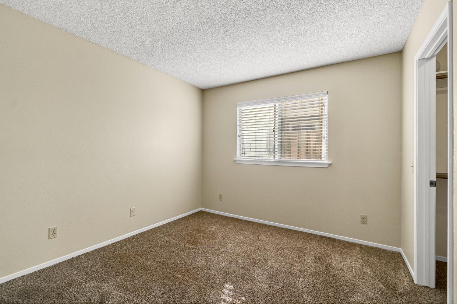3837 North State Street Fresno, CA 93722 - Photo 23 of 33 an empty room with a window