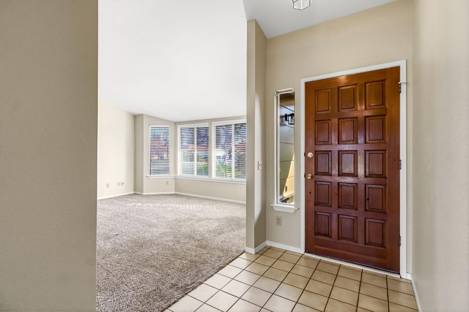 3837 North State Street Fresno, CA 93722 - Photo 5 of 33 a view of an empty room and window