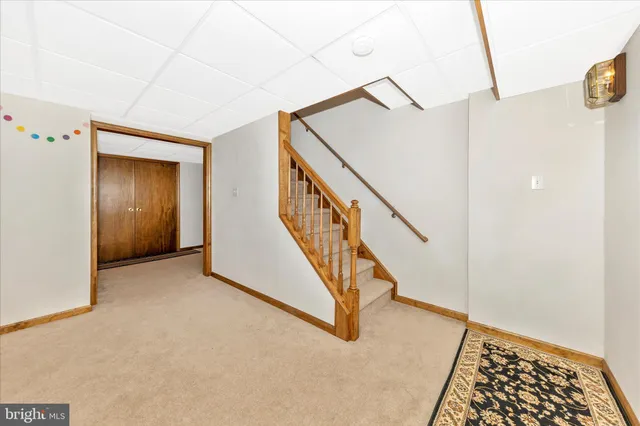 a view of entryway with stairs