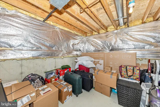 a view of a house with swimming pool and sitting area