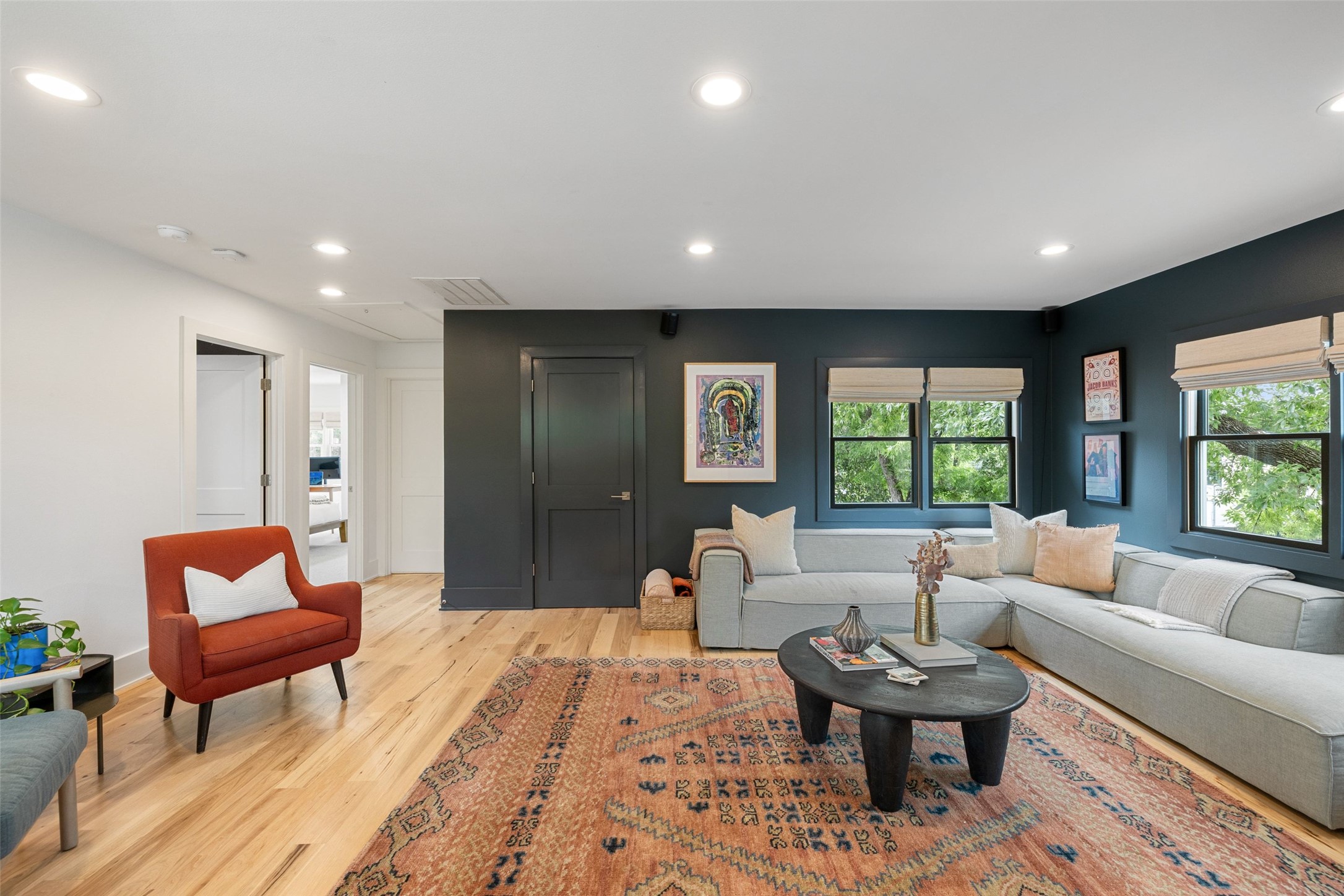 2000 Rundell Place Austin, TX 78704 - Photo 18 of 38 Sun-filled living area featuring rich wood flooring and recessed lighting throughout.