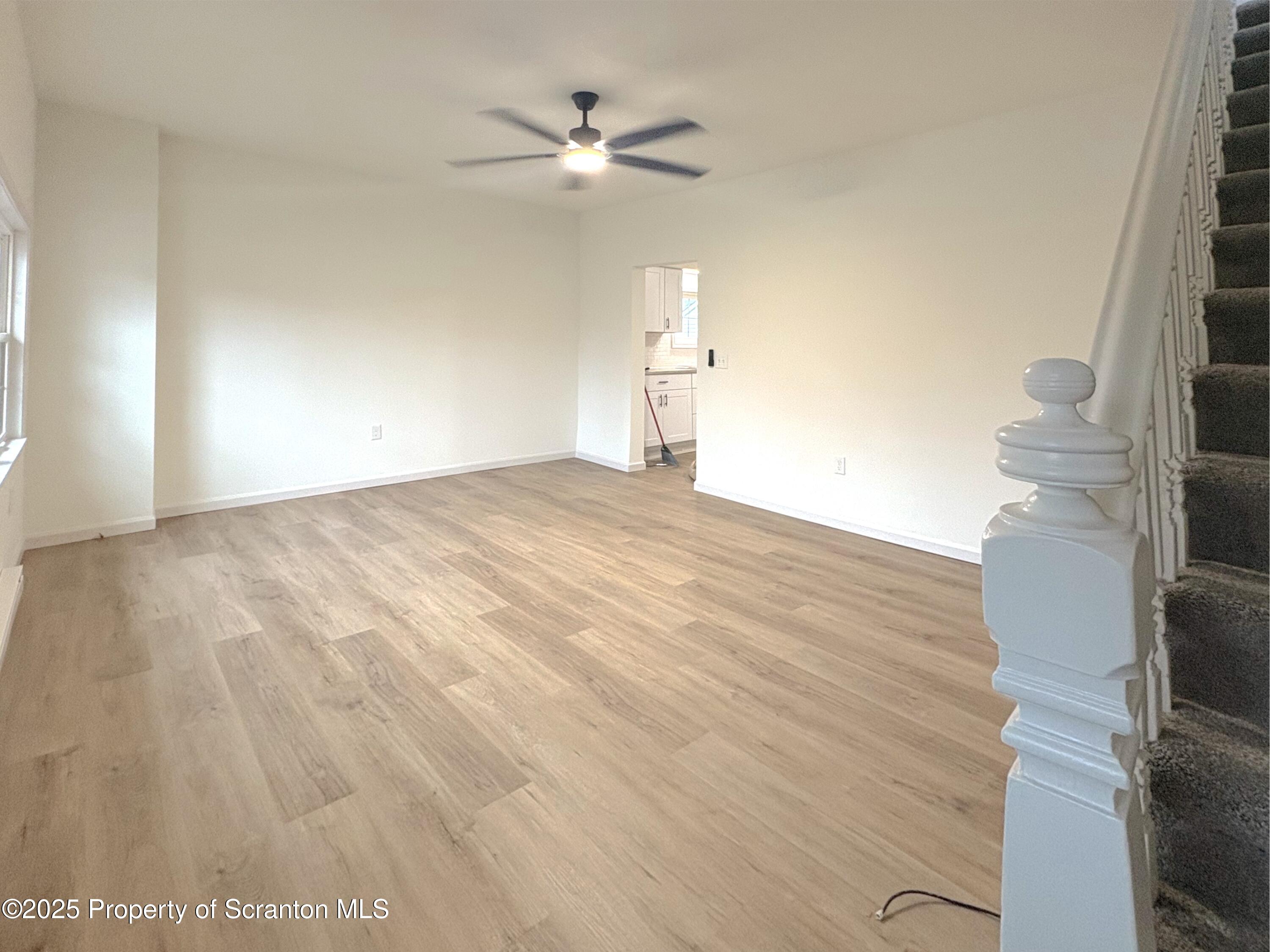 115 West Warren Street Dunmore, PA 18512 - Photo 11 of 36 a view of an empty room with a window