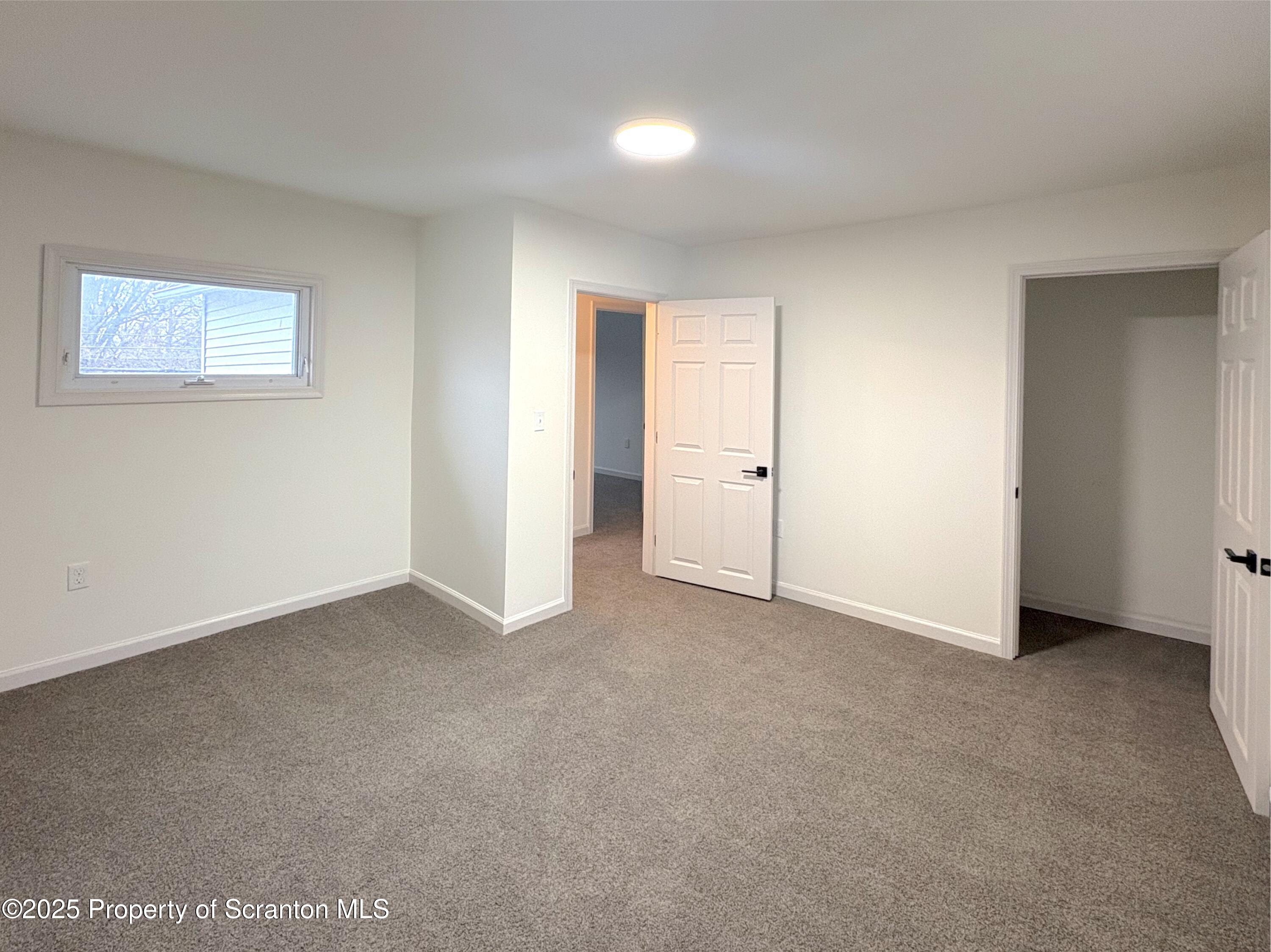 115 West Warren Street Dunmore, PA 18512 - Photo 27 of 36 an empty room with an entryway
