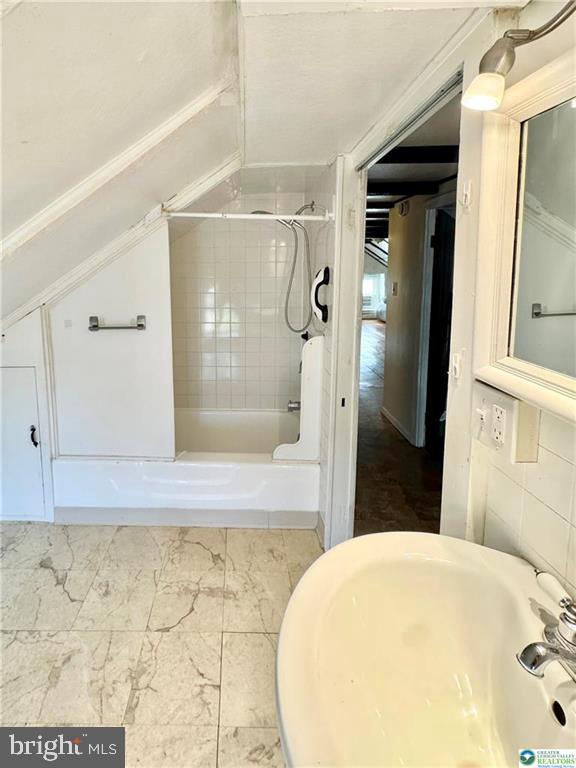 3144 Hamilton Boulevard, Unit 3 Allentown, PA 18103 - Photo 9 of 13 a bathroom with a tub and shower