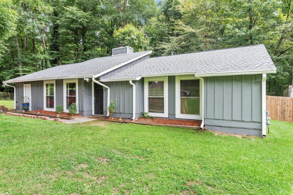 3355 Holly Ridge Trail Southwest Marietta, GA 30008 - Photo 1 of 1 a view of a house with a yard and large tree