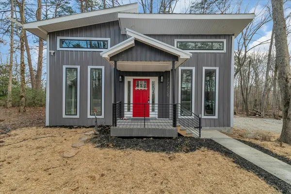 a front view of a house with porch