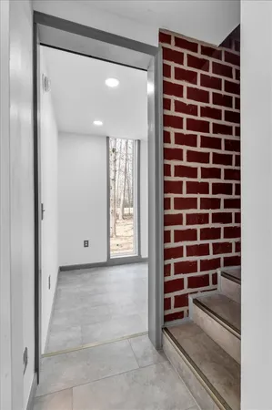 a view of a brick building with many windows