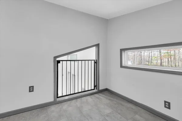 an empty room with windows