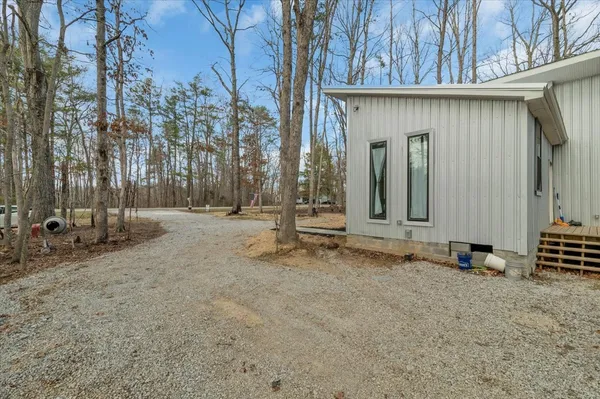 a car parked in front of a house