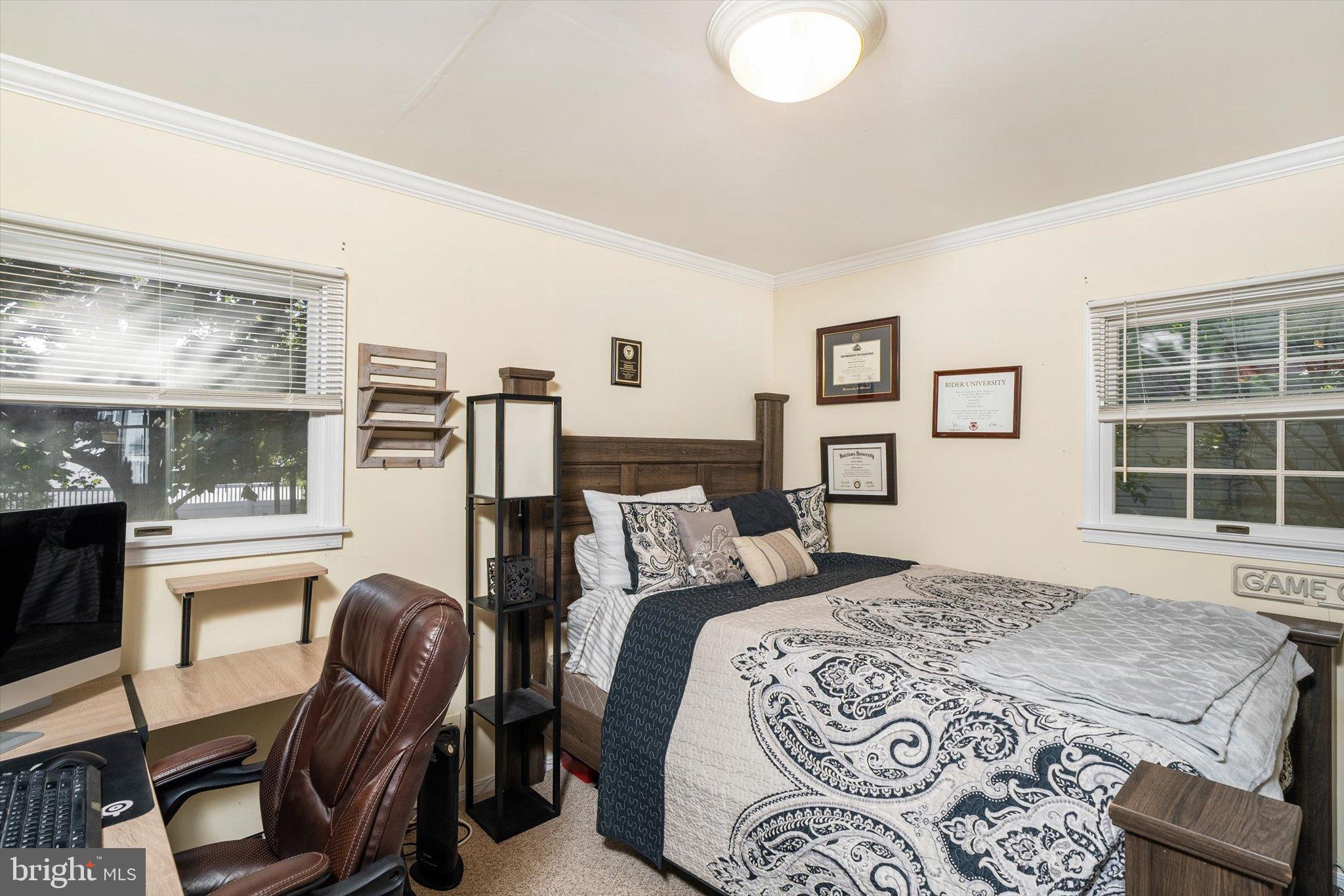 23 Beaumont Road Hamilton, NJ 08620 - Photo 18 of 45 a bedroom with a bed and wooden floor