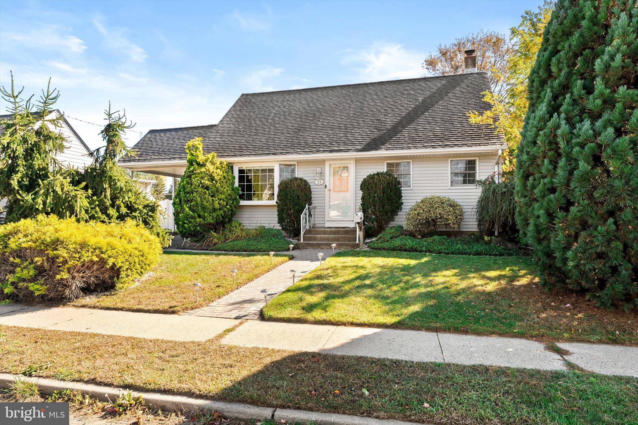 23 Beaumont Road Hamilton, NJ 08620 - Photo 2 of 45 a front view of house with yard
