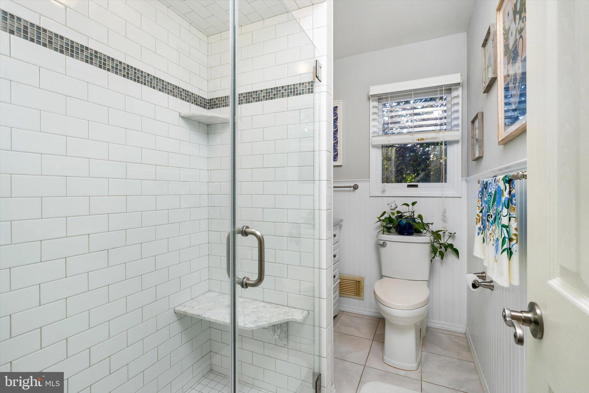 23 Beaumont Road Hamilton, NJ 08620 - Photo 21 of 45 a white toilet sitting next to a bathroom sink